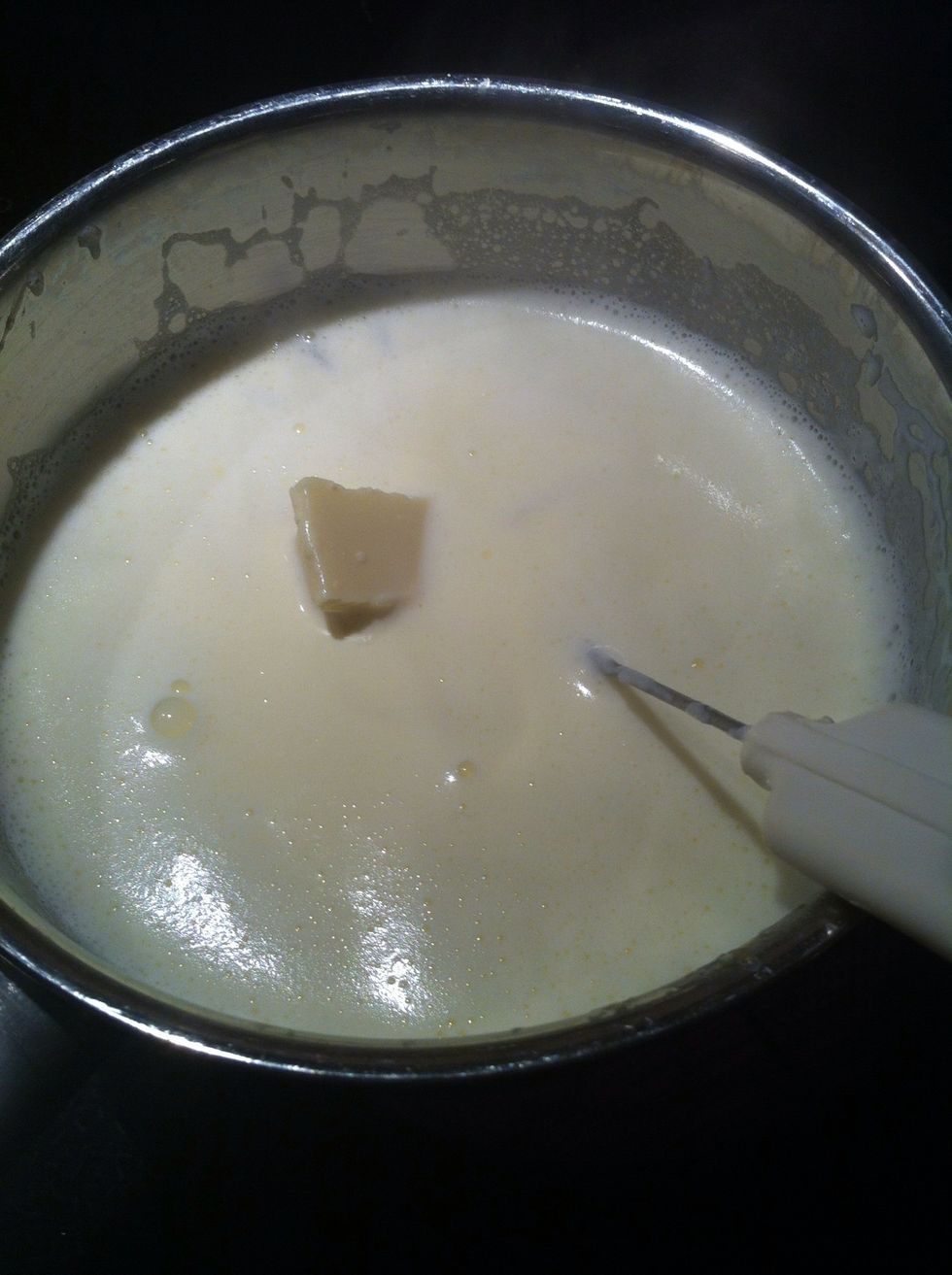 When the cream boils, put in your chocolate and whisk until it has melted