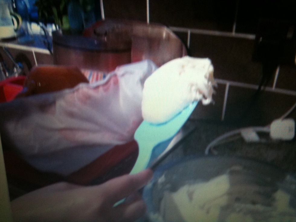 When the cupcakes have cooled down, spoon a third of the frosting into the piping bag.