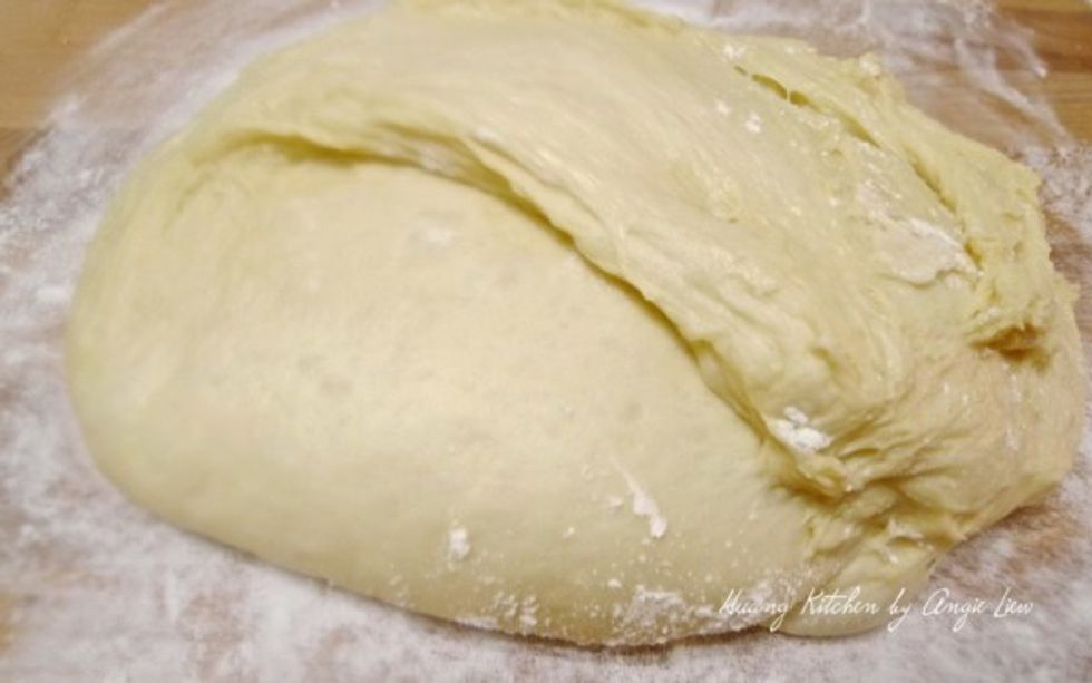 When the cycle finishes, turn the dough out onto a floured surface. Knead lightly to form into a round shape.
