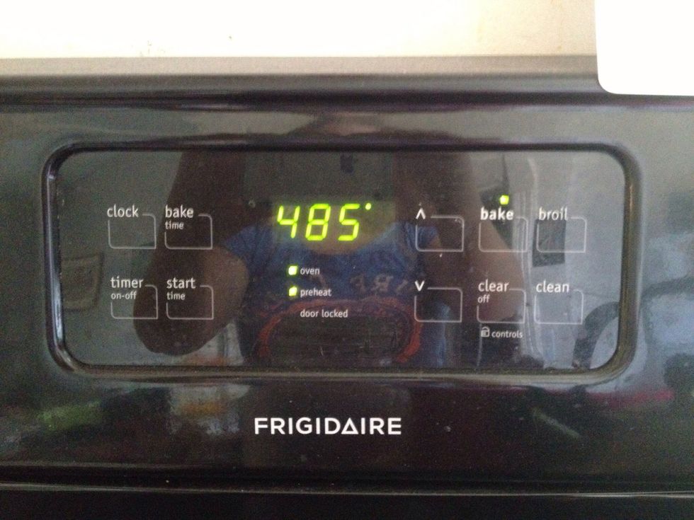 When the dough has risen for over an hour pre-heat the oven to 480 Fahrenheit.