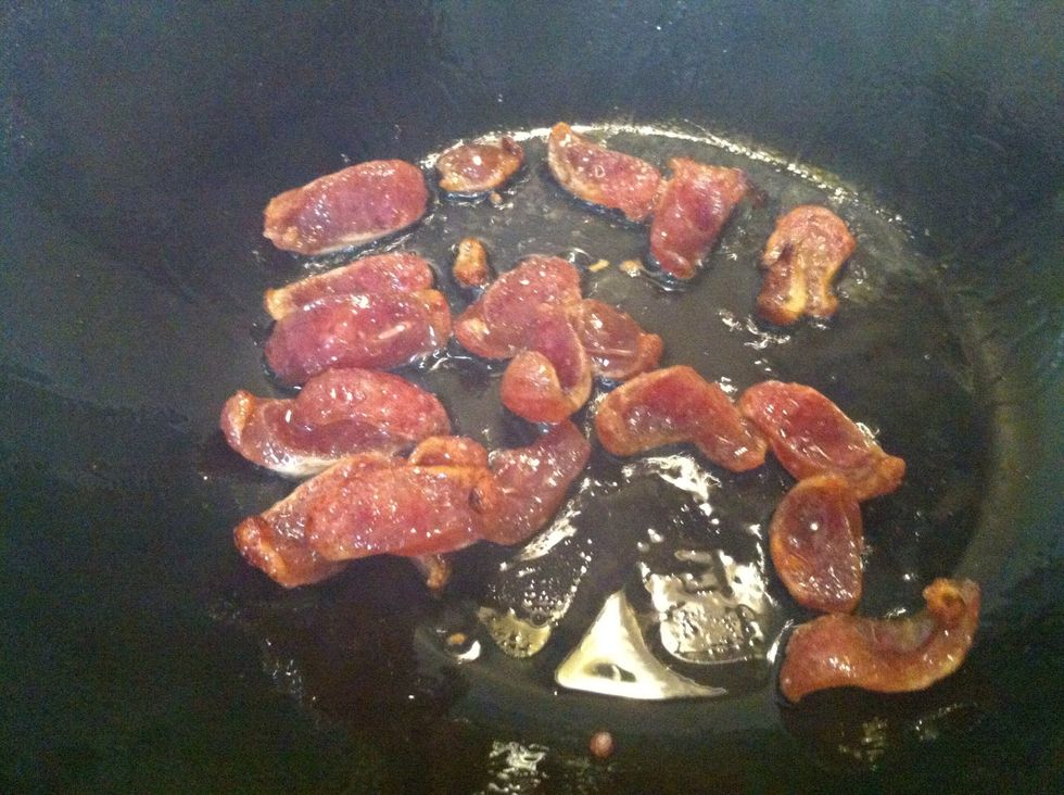 When the edges crisp up remove from wok and keep aside