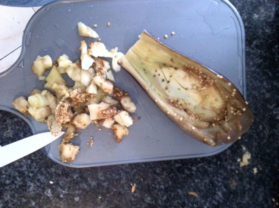 When the eggplant is ready: we empty it and add we the flesh to the previous mix in order to cook everything together a pair of minutes