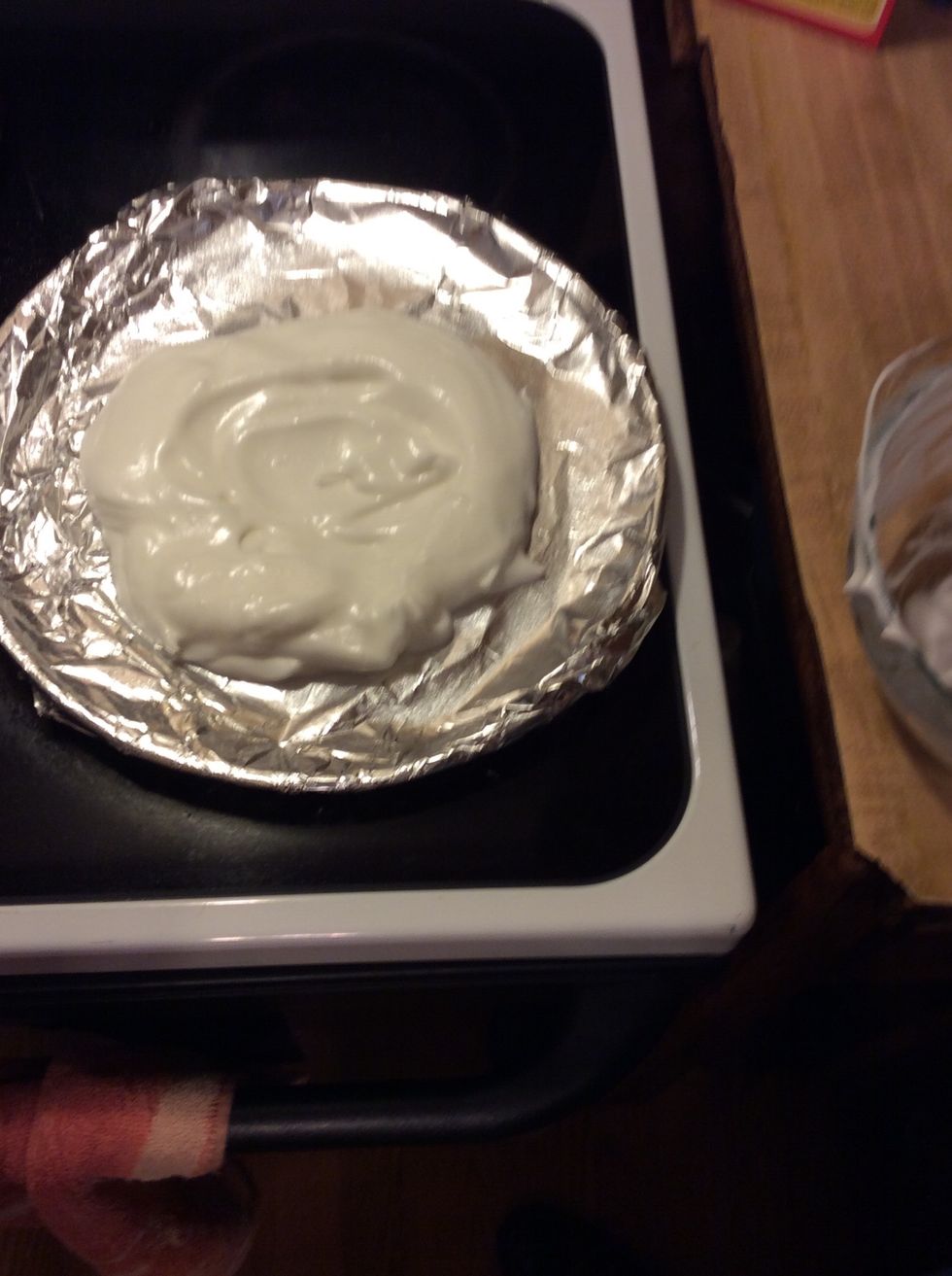 When the eggs are stiff, pour into a circle with a dip in the middle