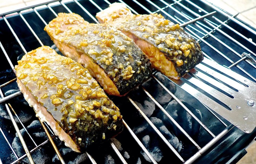 When the fillets have begin to flake, use a thin-bladed turner to carefully flip the fish over.