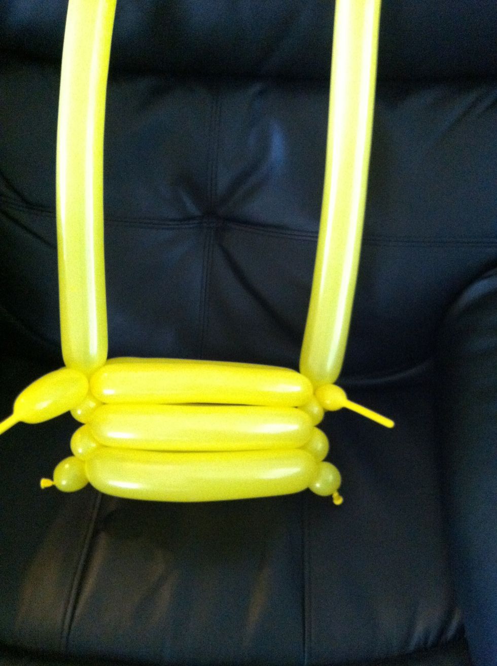 When the first two balloons are used up, twist two more balloons into their place