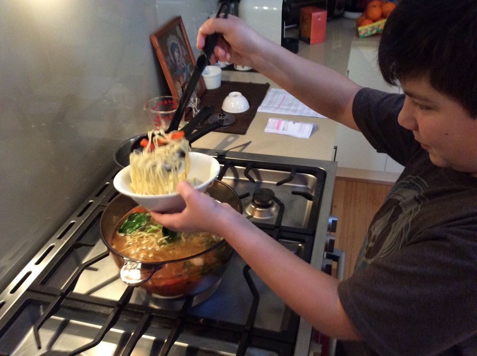 When the fish is cooked place the noodles back in to the stock and serve together.