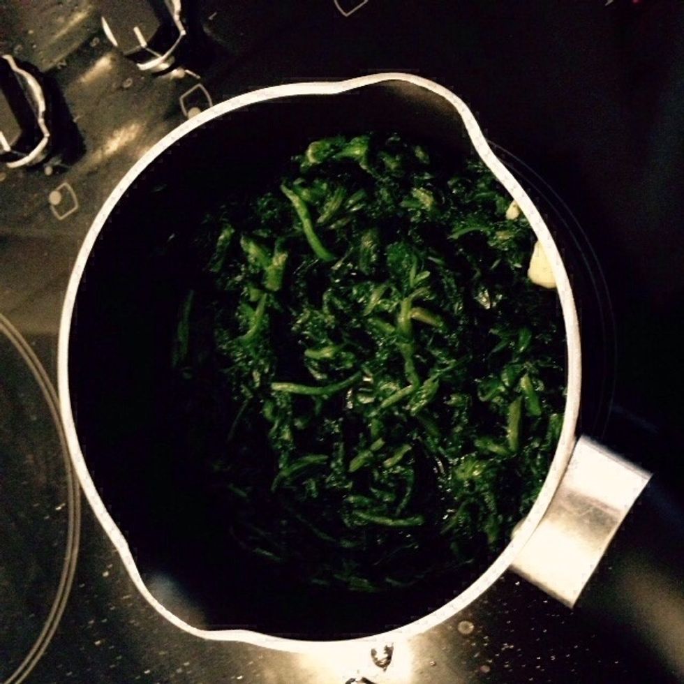 When the garlic is roasted add the boiled/frozen spinach, cook for about 10min on a low heat