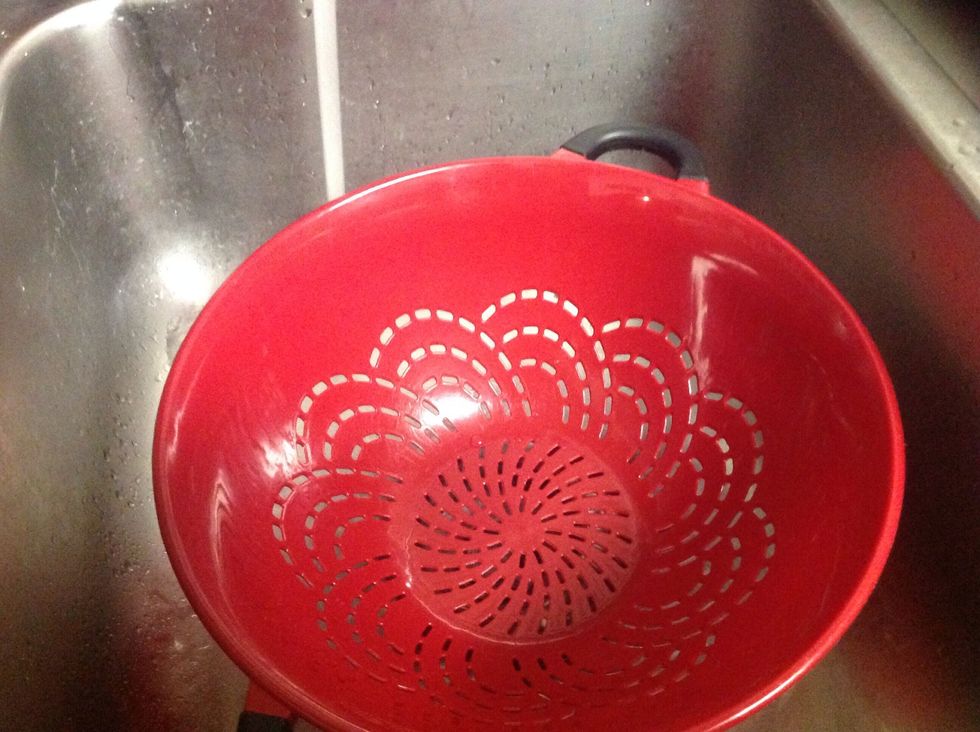 When the ground beef is done put a strainer in the sink with the hot water on and strain the ground beef then put back into the pot and set aside....