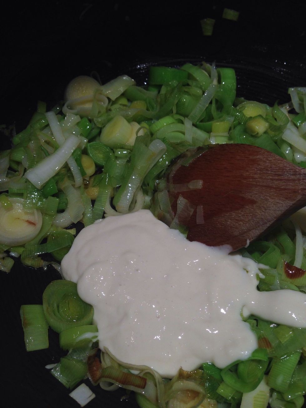 When the leeks are soft at the paste to the pan and increase the heat