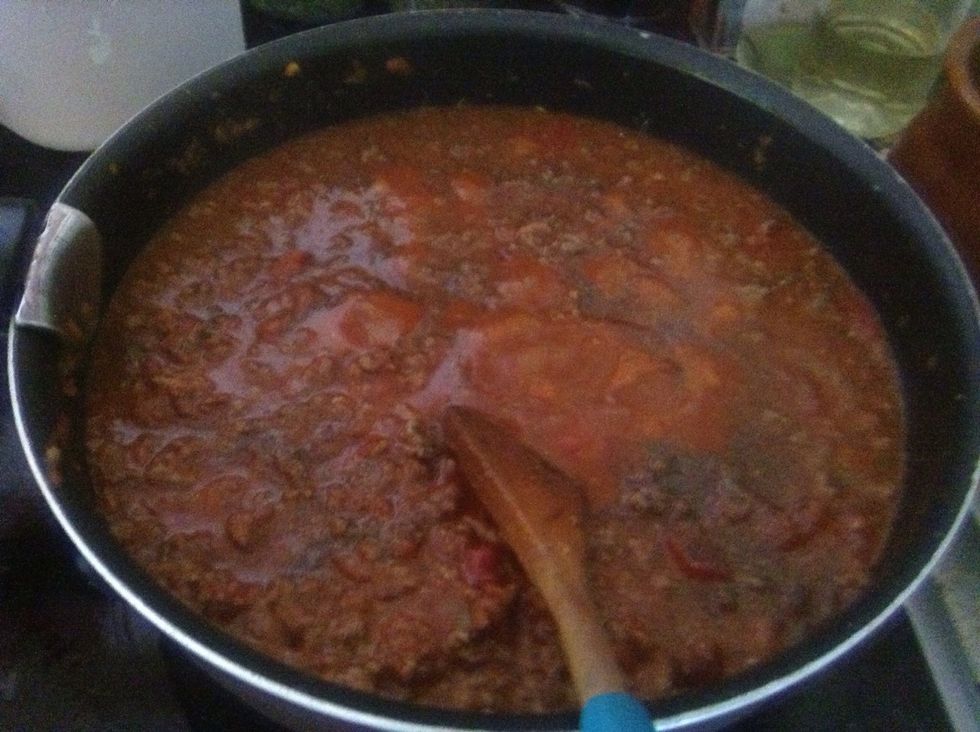 When the meat is pinkish, add the tomato sauce