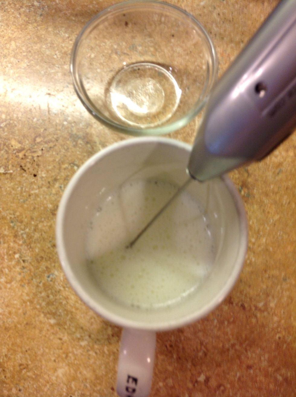 When the milk is steaming (about 50 sec in the microwave) use the milk frother to froth the milk as per the directions included with your particular frother.