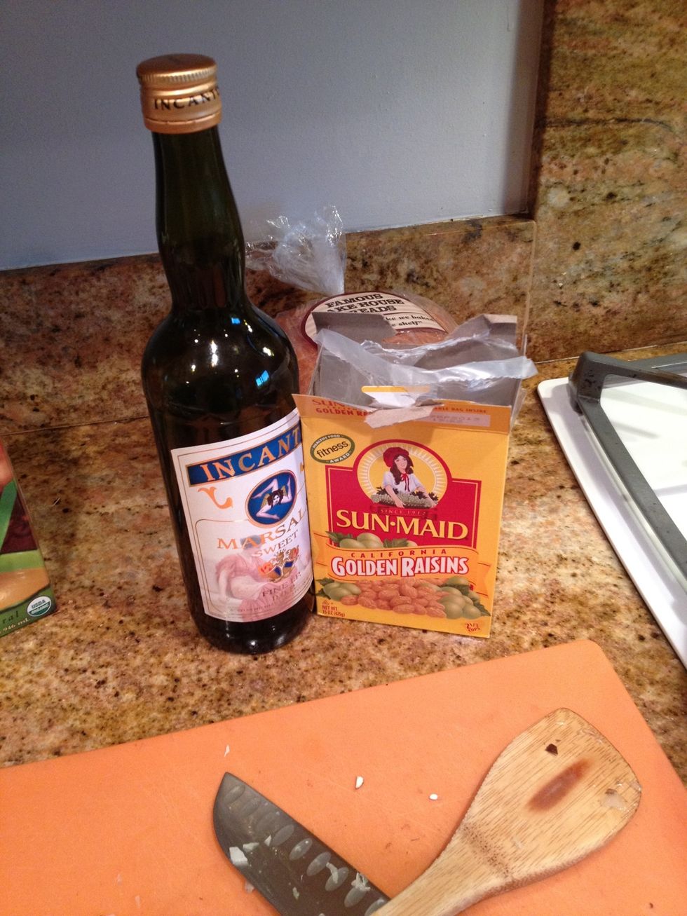 When the mushrooms and onions have saut\u00e9ed mushrooms are brown add the raisins and the marsala