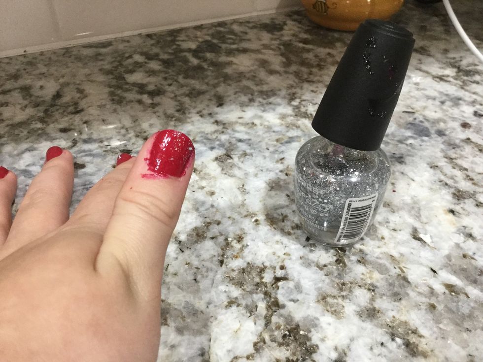 When the nail polish dries, start putting the sliver glitter nail polish on.\ud83d\ude00