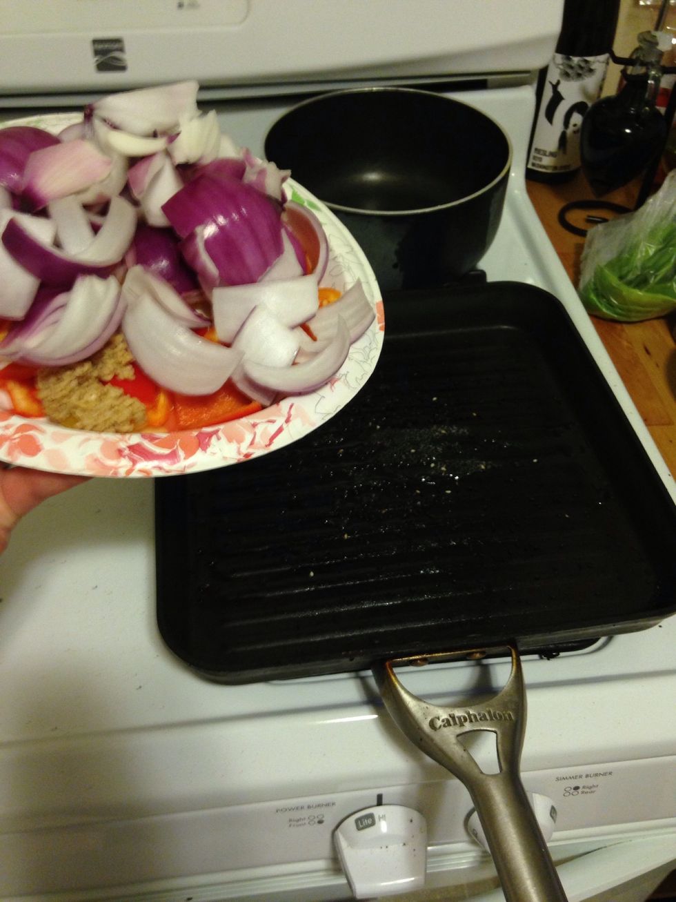 When the oil is hot, add the veggies to the oil.