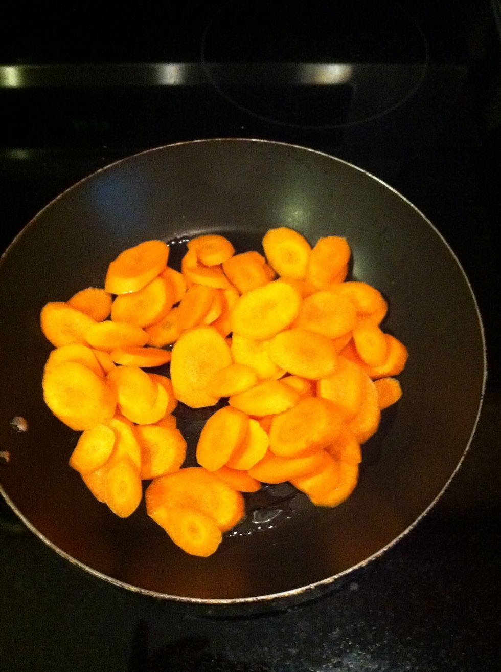 When the oil is hot add your carrots, and saut\u00e9 for about 2 mins on med heat.