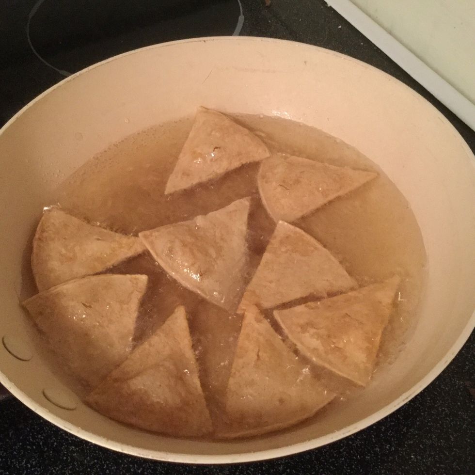 When the oil is ready drop a few in at a time.... Is only takes a few seconds for them to get crispy or they will burn