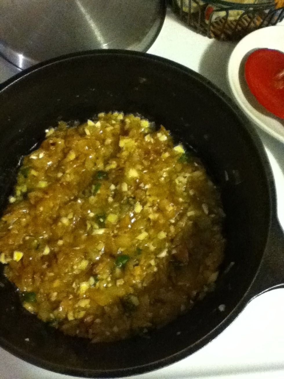 When the onions are ready, turn the heat back up and toss in your garlic, ginger and chilies. Stir fry for a minute or two. Now you know why this is 'bachelor-style'. Garlic is a vegetable, dude.