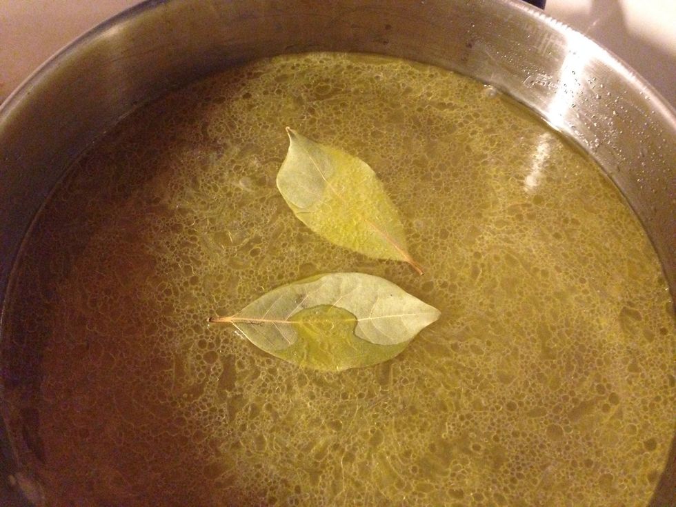 When the onions are soft ad the water, bouillon and bay leafs (or stock, then don't ad the bouillon) and let it boil for 15 min.