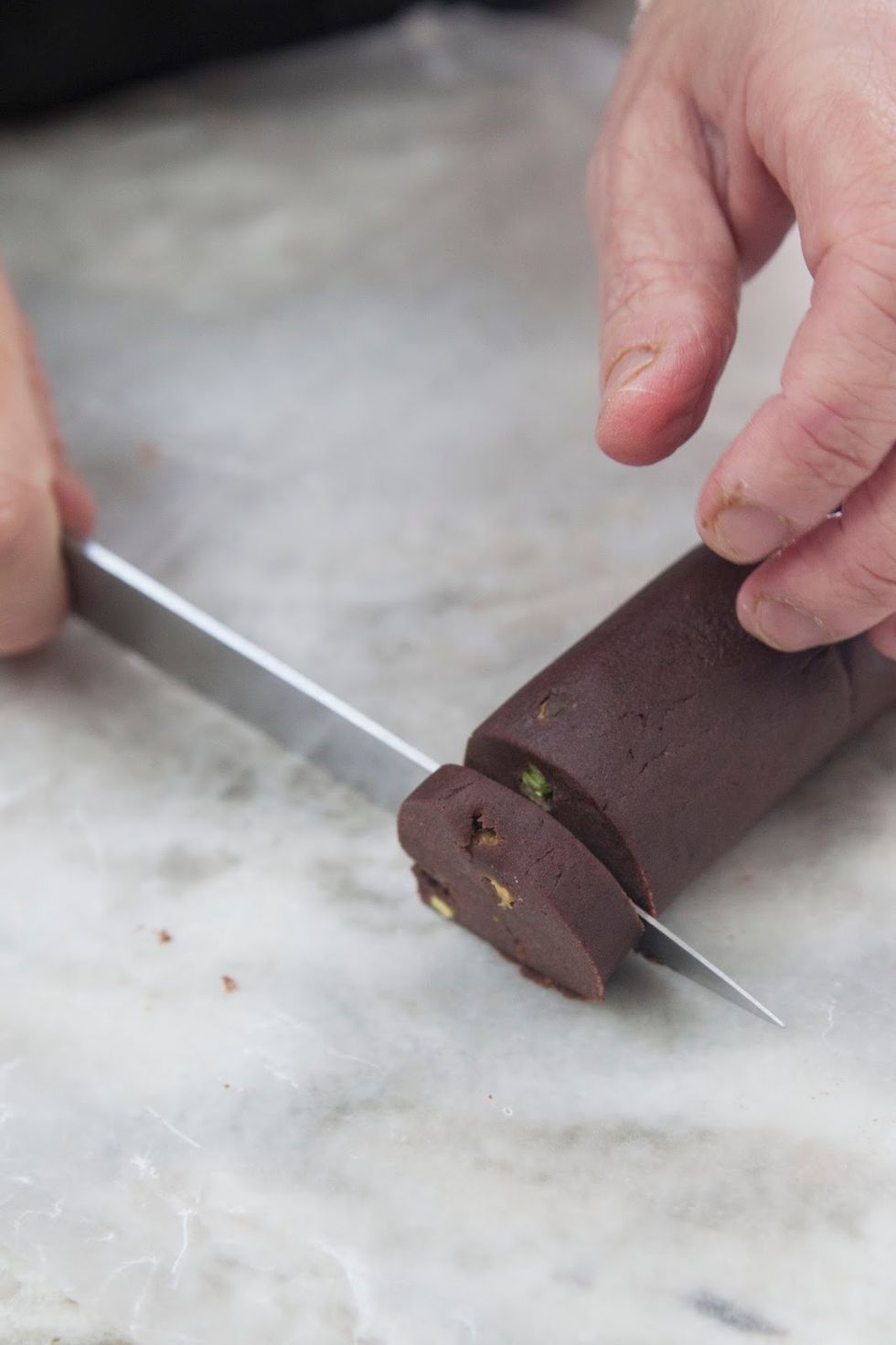 When the oven is up to speed and the dough is nice and firm, unwrap and slice. Not too thick but just right.