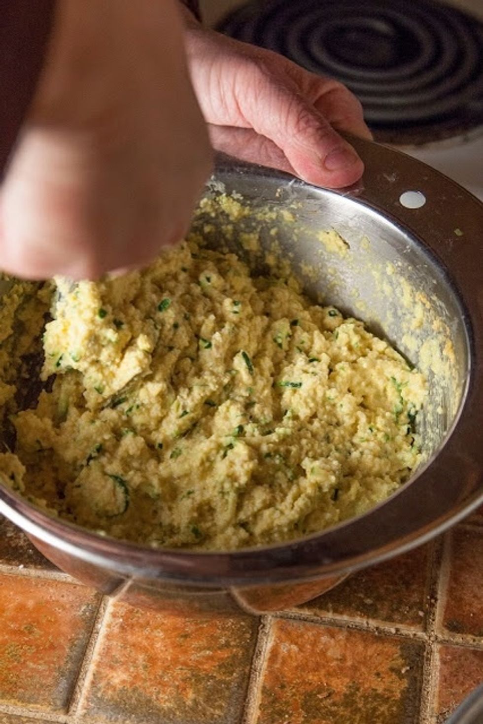 When the oven is up to speed, mix the citric acid, and the baking soda into the batter stirring in 1 direction only. The batter will start to get foamy.