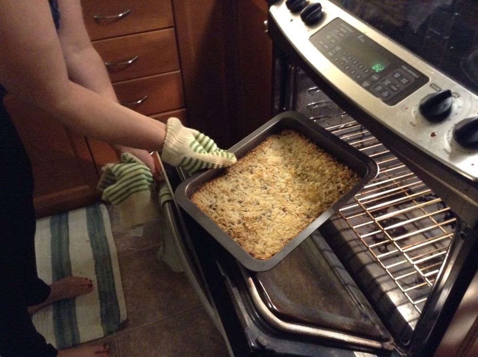 When the oven timer goes off take your oven mits and pull out the pan