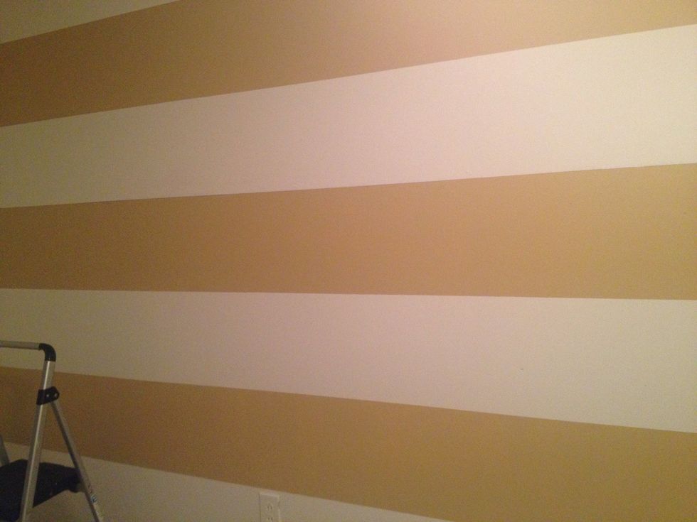 When the paint is tacky, remove your frog tape. Then wait for paint to dry completely.