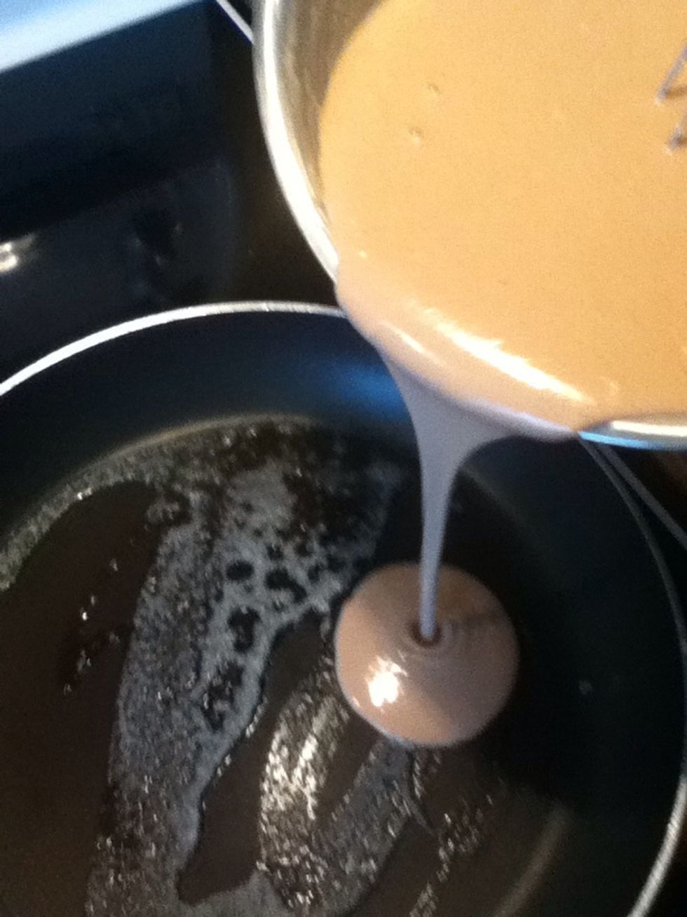 When the pan is hot, start baking your crepes by pouring approximatively 3/4 cup of the preparation for each crepe.
