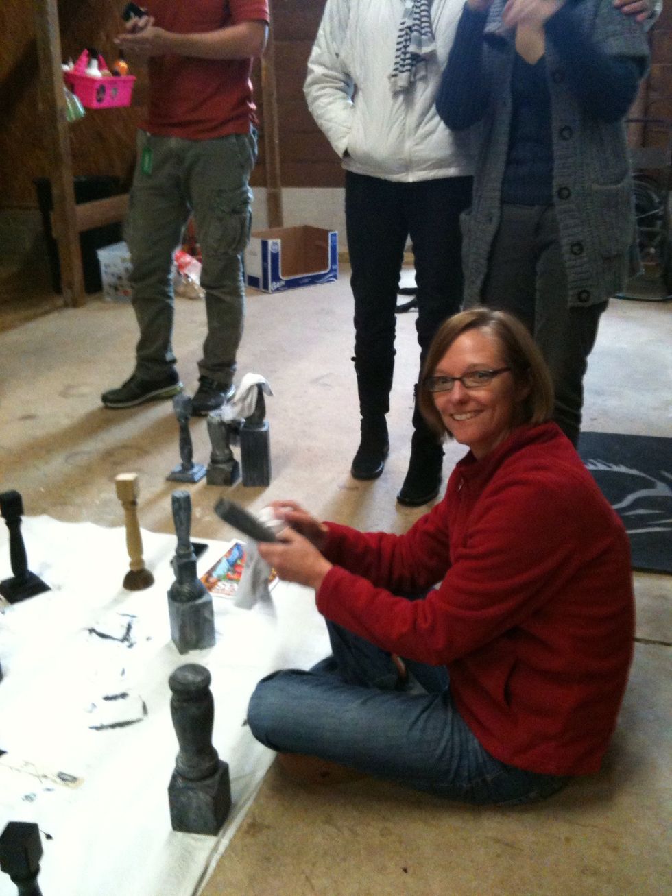 When the pillars are dry, rub white chalk over them (work it into the grooves in the wood). Roughing up the smooth sections will help the chalk stick. Then, use a soft cloth to rub off the excess.