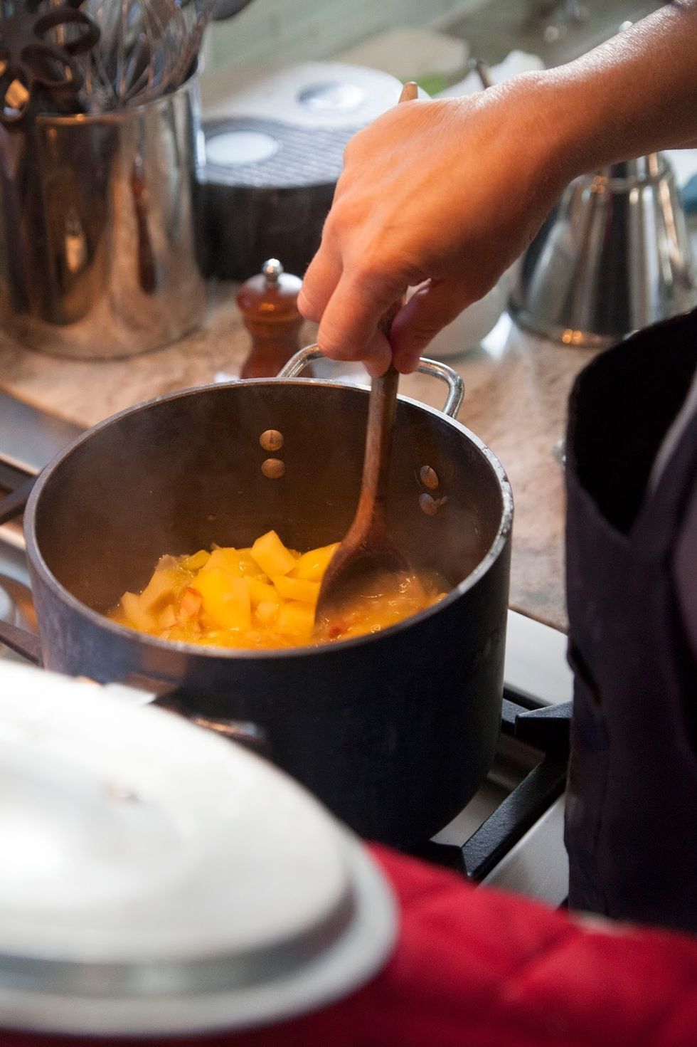 When the potatoes are nice and soft, puree the soup using an immersion blender or some other device. You want your soup to be nice and thick, if you need to thin itjust add more water or broth.