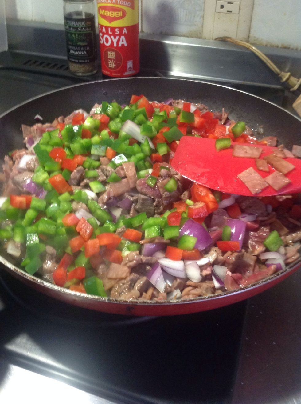 When the proteins are cooked half way, add the vegetables and let it cook in low heat.