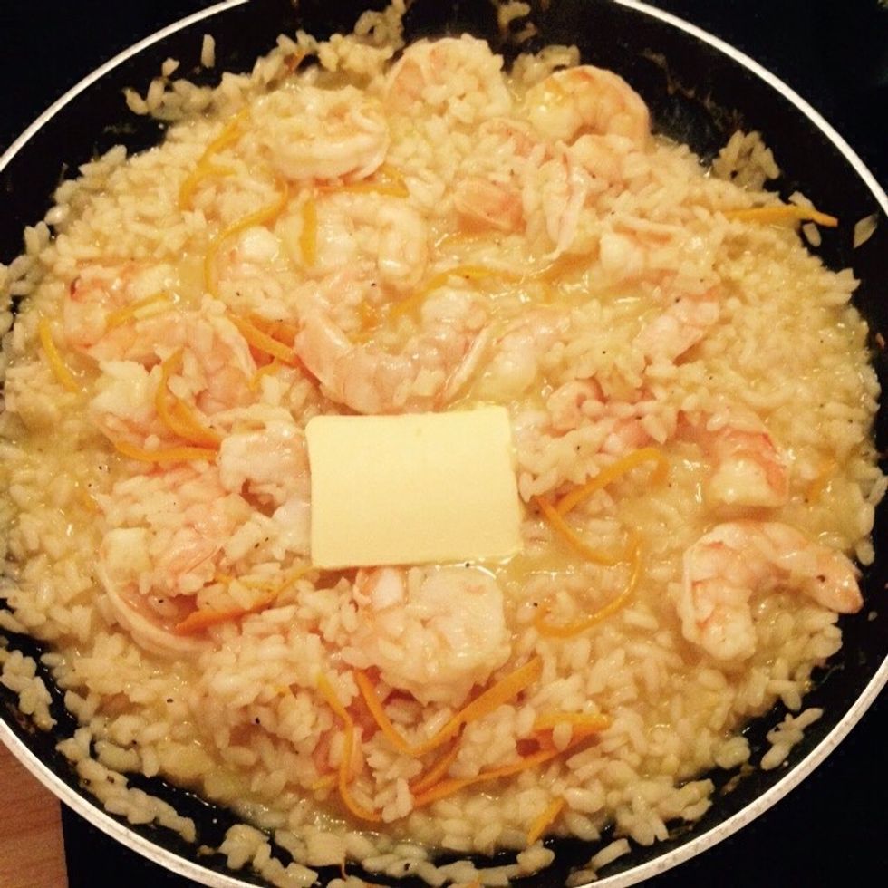 When the rice is cooked turn off the heat and add the butter