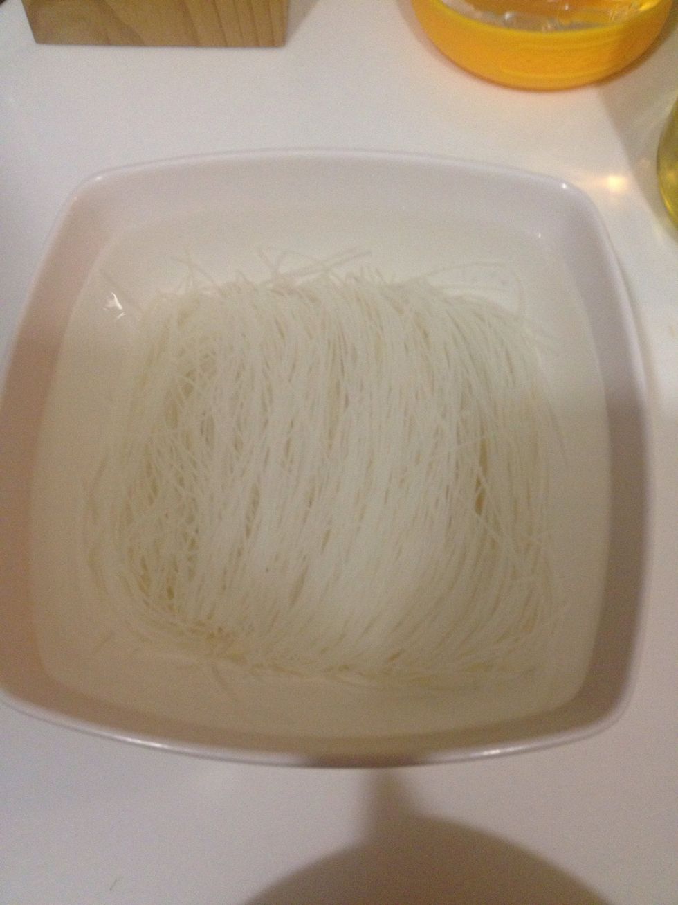 When the rice vermicelli turn white, discard the water. Usually takes bout 5-10 minutes.