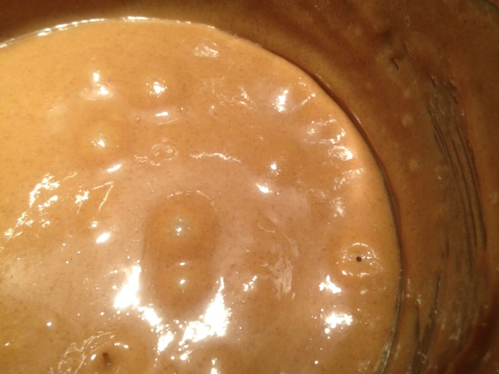 When the sauce boils, it's ready. Time to coat the popcorn. You need to work fast. It's very sticky but with get hard as it cools.