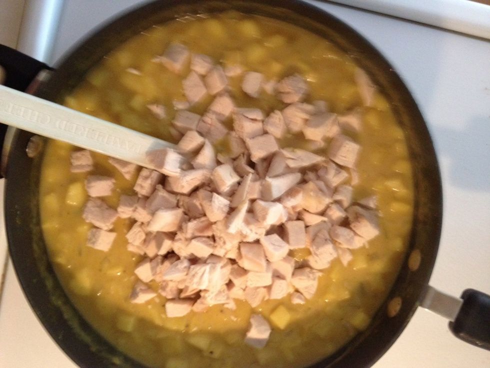 When the sauce had thickened, add the diced cooked chicken and heat until thoroughly warm.