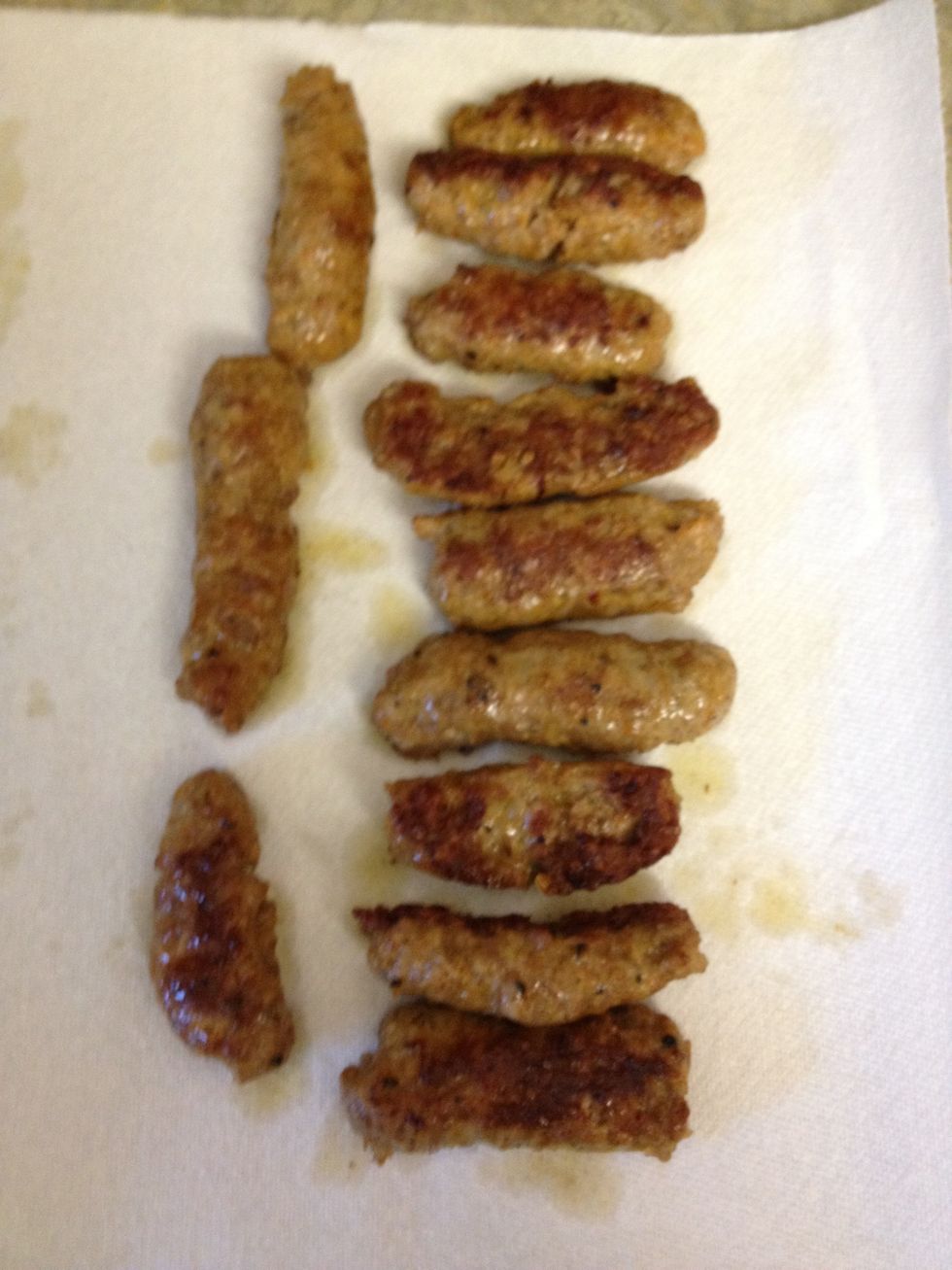 when the sausage is done, we like to use a paper towel to get all the excess grease out.