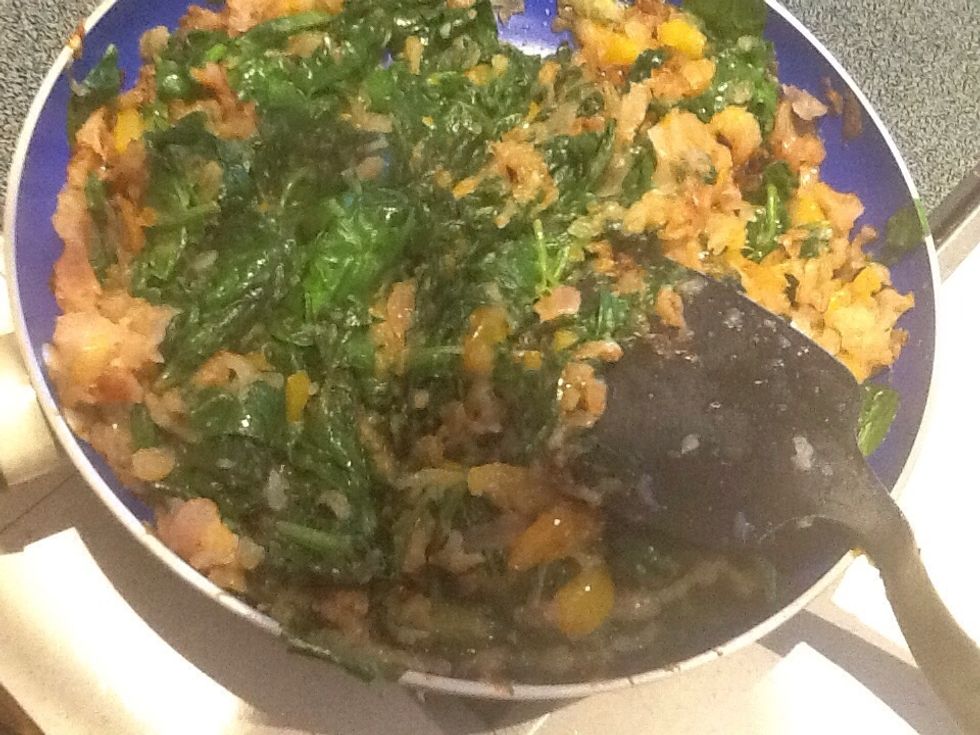 When the spinach is steamed, chop some with spatula. Allow to cool.