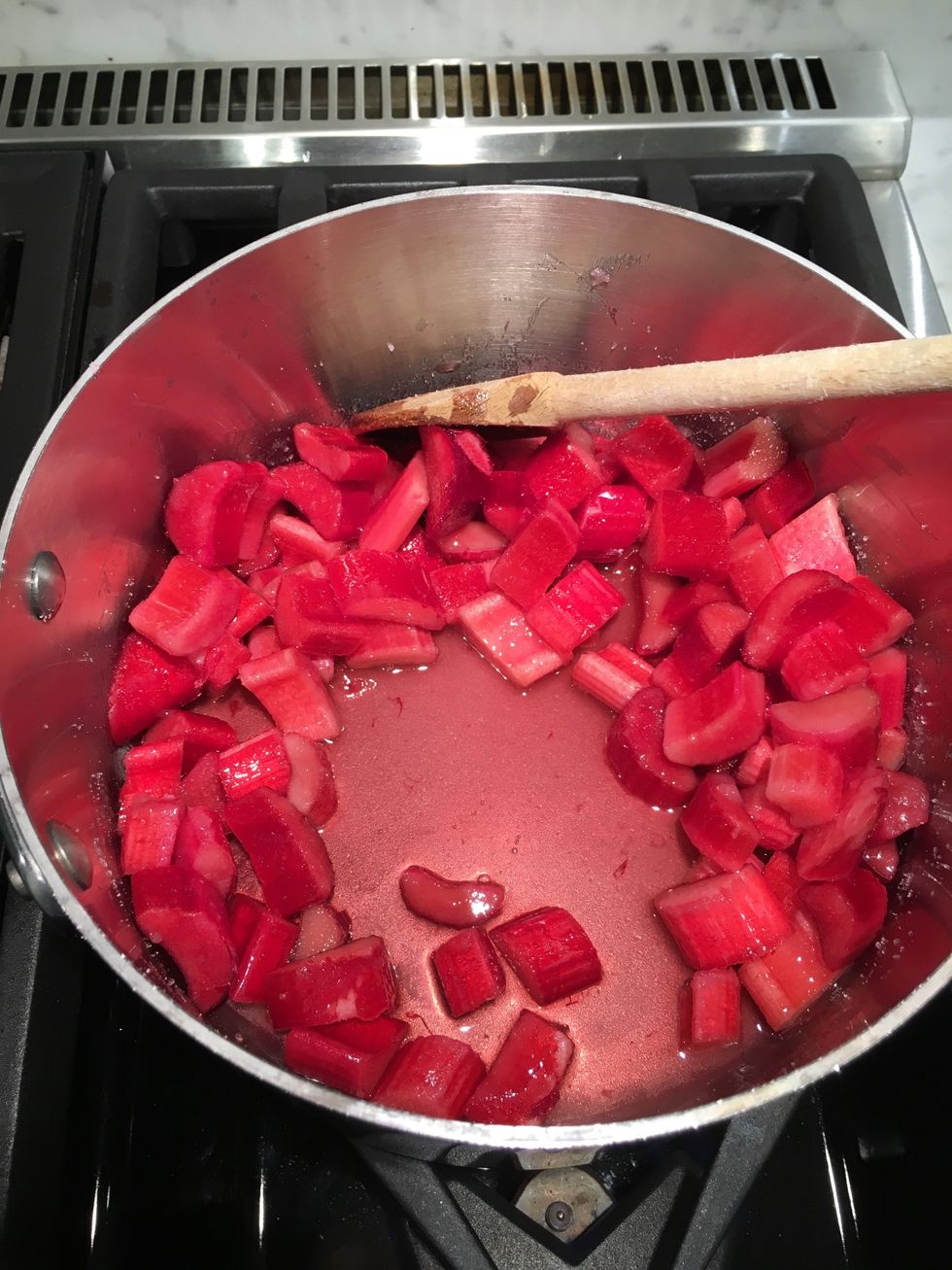 When the sugar dissolves and the juice begins to flow, turn it up to medium. Keep stirring so you don't scorch/burn the rhubarb. I burned some rhubarb jam this morning and I'm pretty crabby about it.