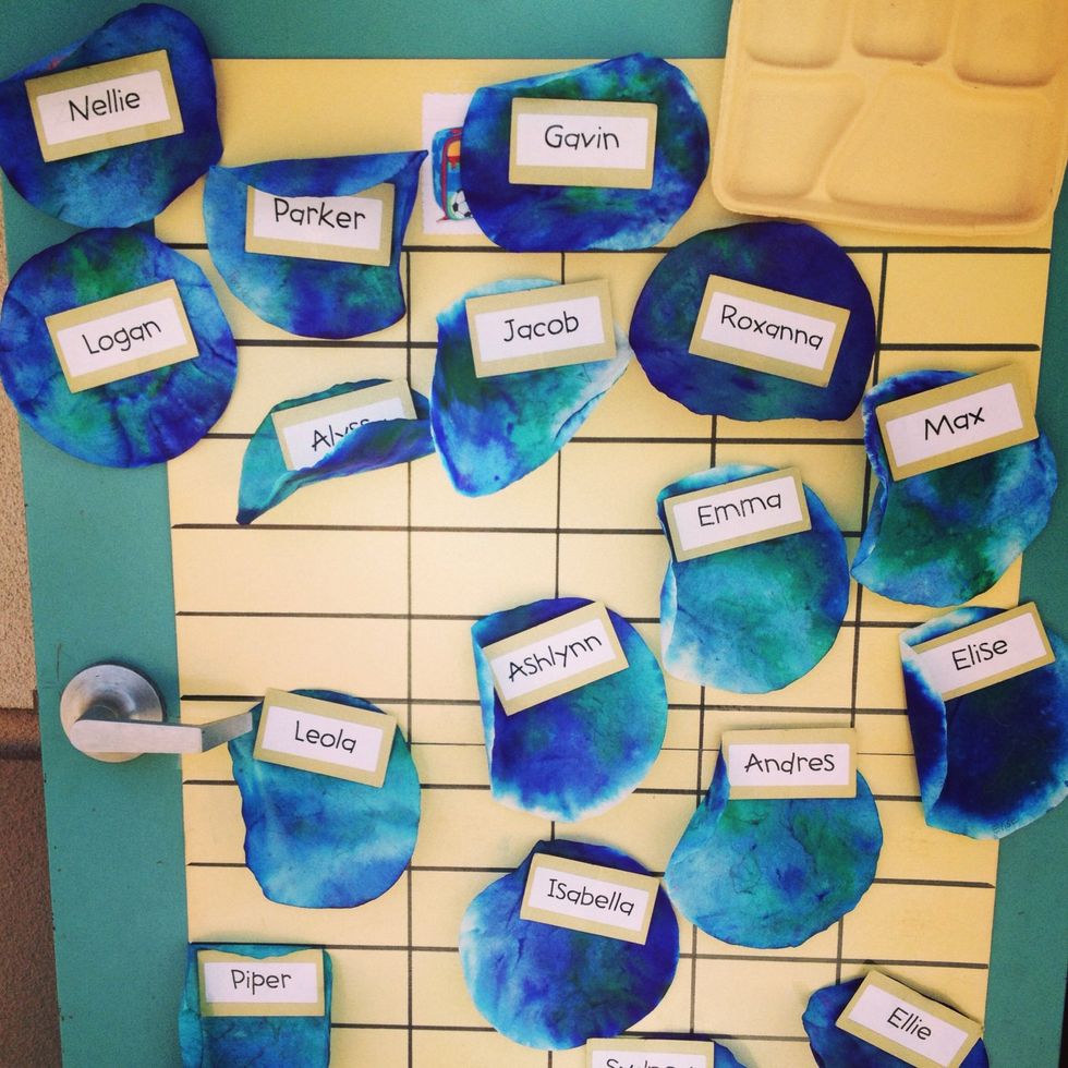 When the sun has almost dried them, make sure you secure them, so they don't blow away. We used the name magnets on our metal door.