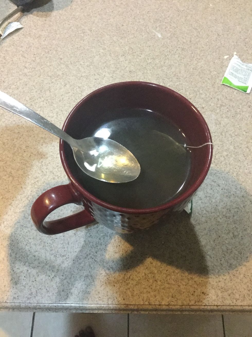 When the tea bag is soaking take your ladle and add the tea to the milk mixture