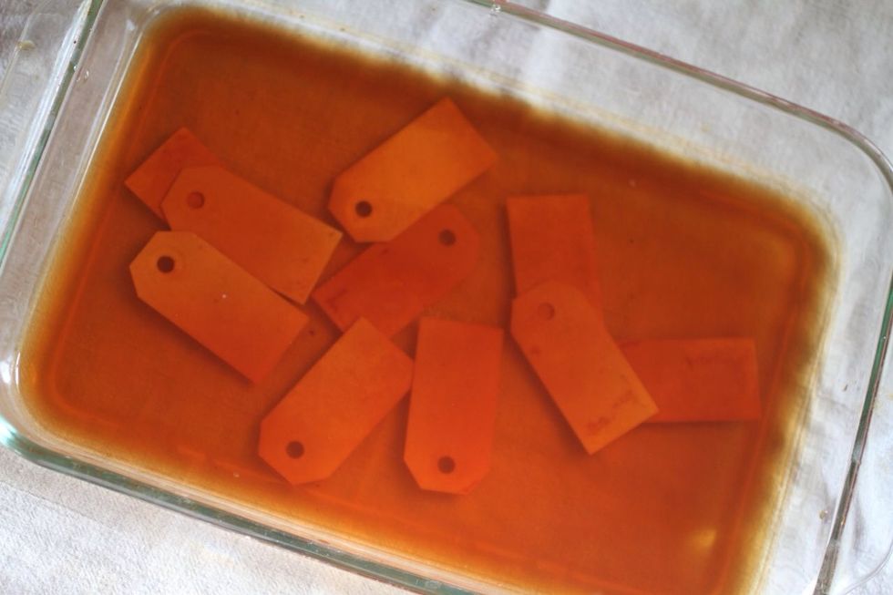 When the tea has steeped long enough to color your water a rich brown, place gift tags in the brew.