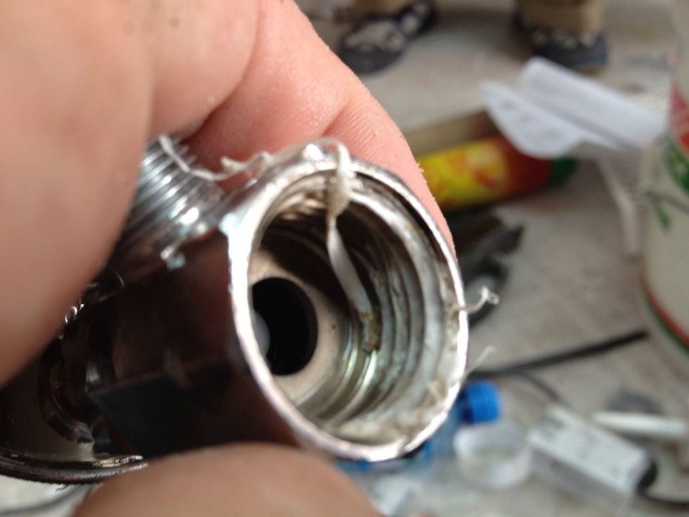 When the threads are tightened, the tape gets shredded & fills the thread valleys to seal any space that would have been between the metal treads of the valve housing & the PVC threads of the pipe.
