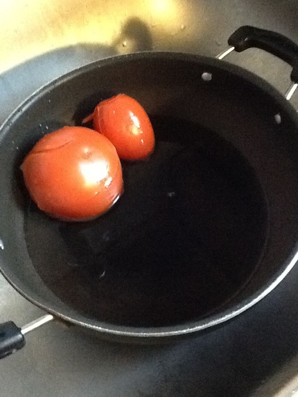 When the top layer of the tomatoes starts peeling off turn gas off and peel the top layer