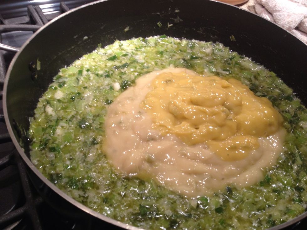 When the veggies are tender, add in both cans of cream of celery soup. (I don't know why these were different colors.)