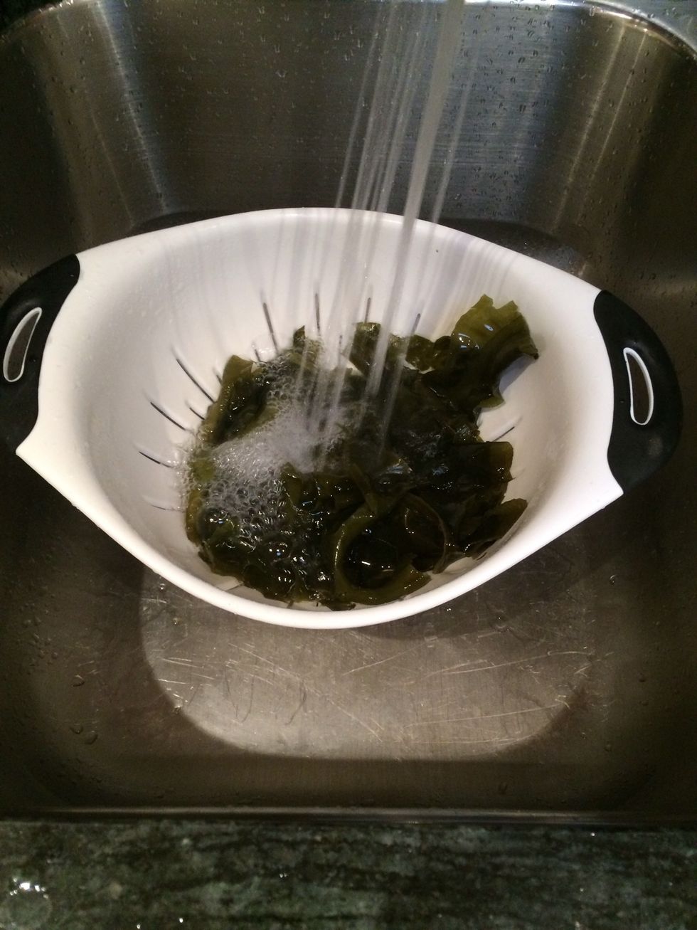 When the wakame has softened, drain and then rinse under cold water.