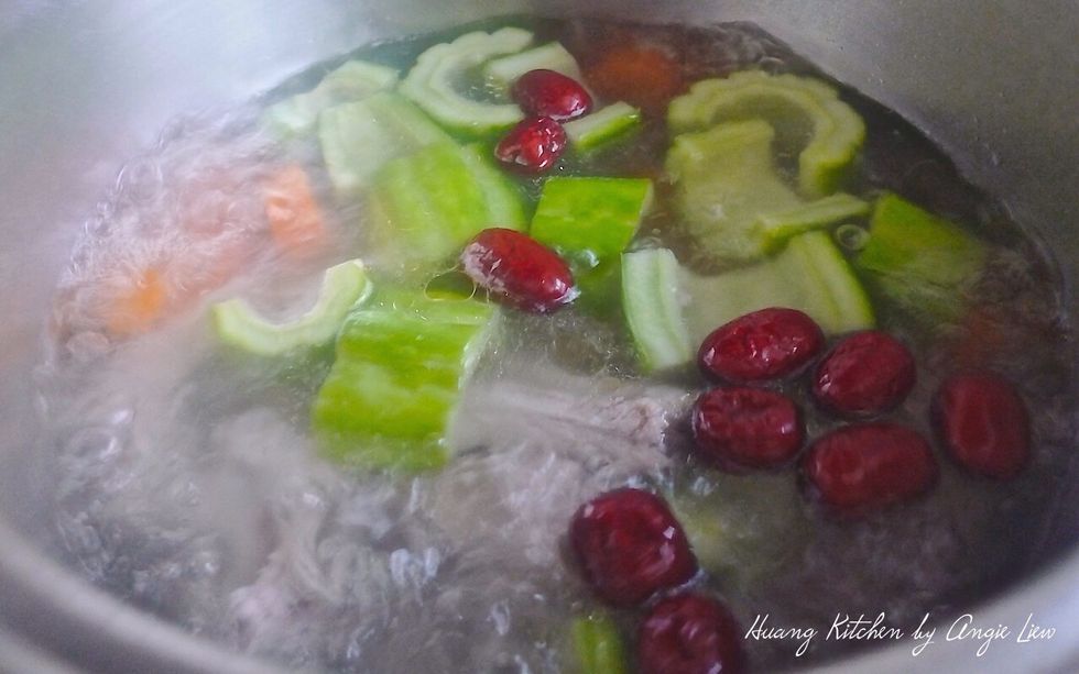 When the water comes to a boil again, lower heat and simmer for 45 to 50 minutes.