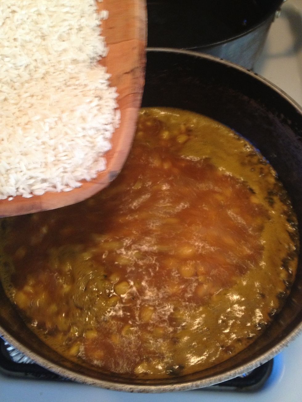 When the water has come to a rolling boil add the rice