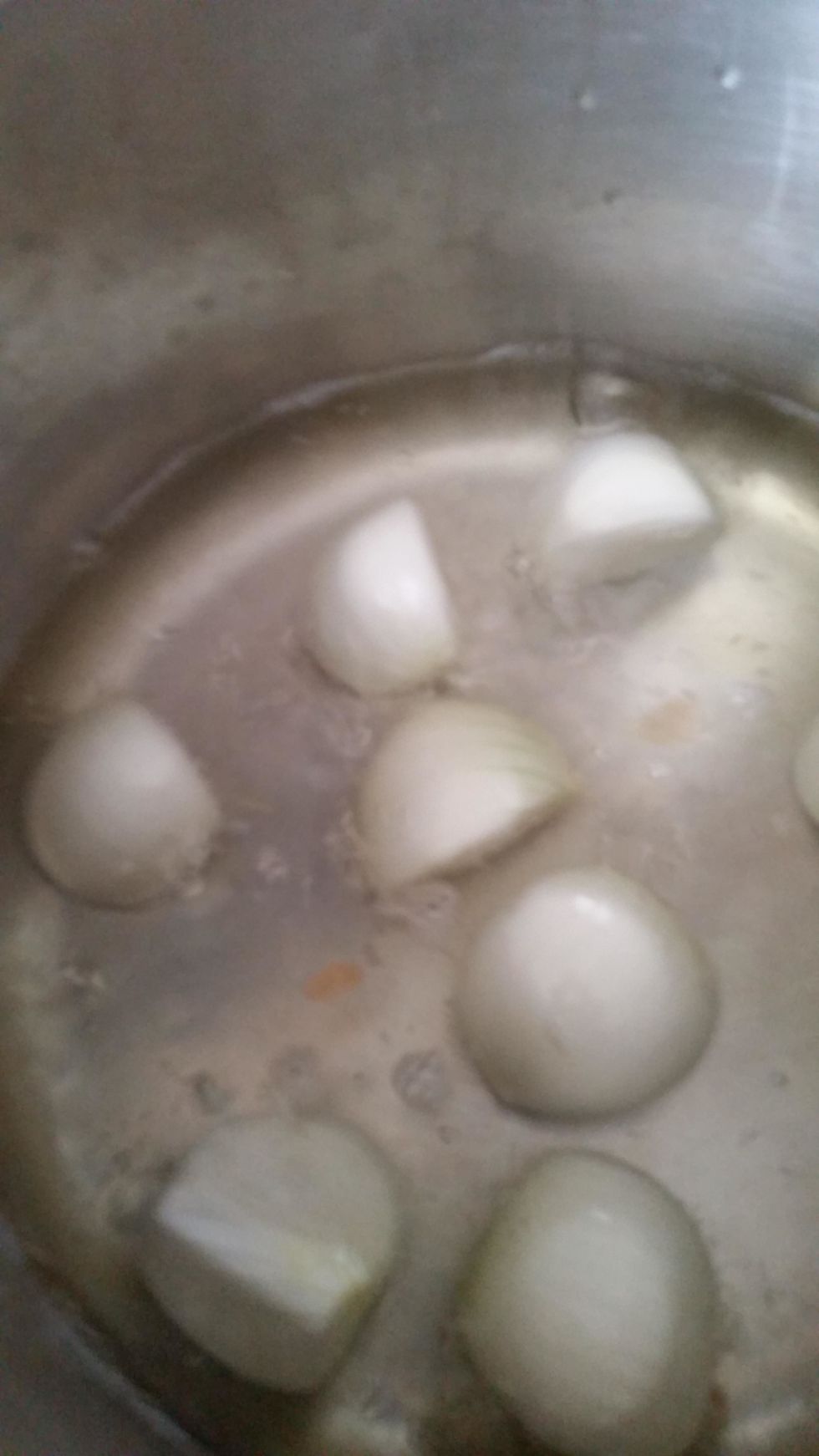 When the water is boiling... add the onions. Also add 2 TBS of salt. Put lid on.