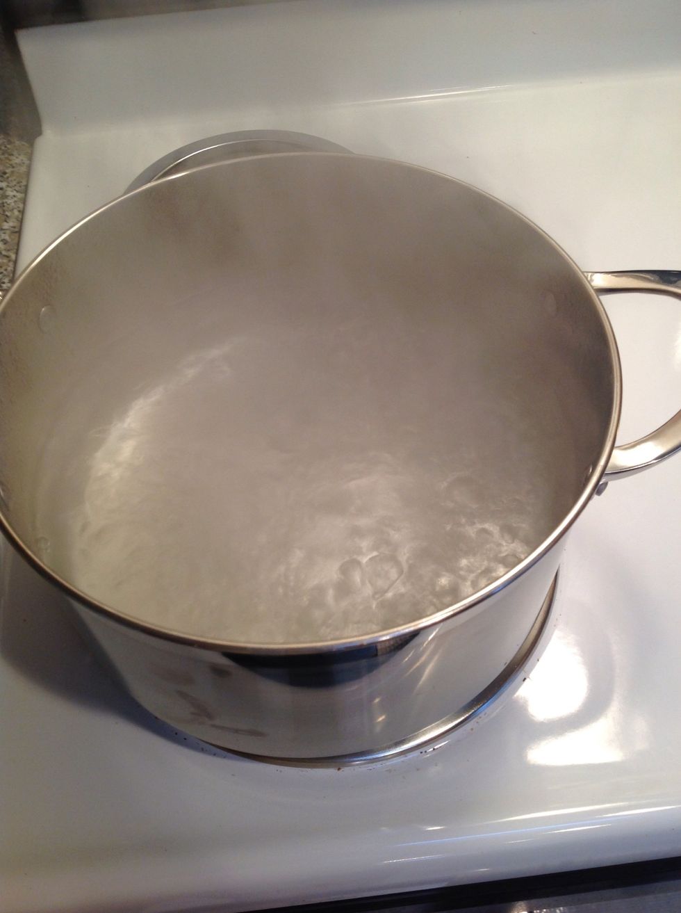 When the water is rapidly boiling, add the potatoes.