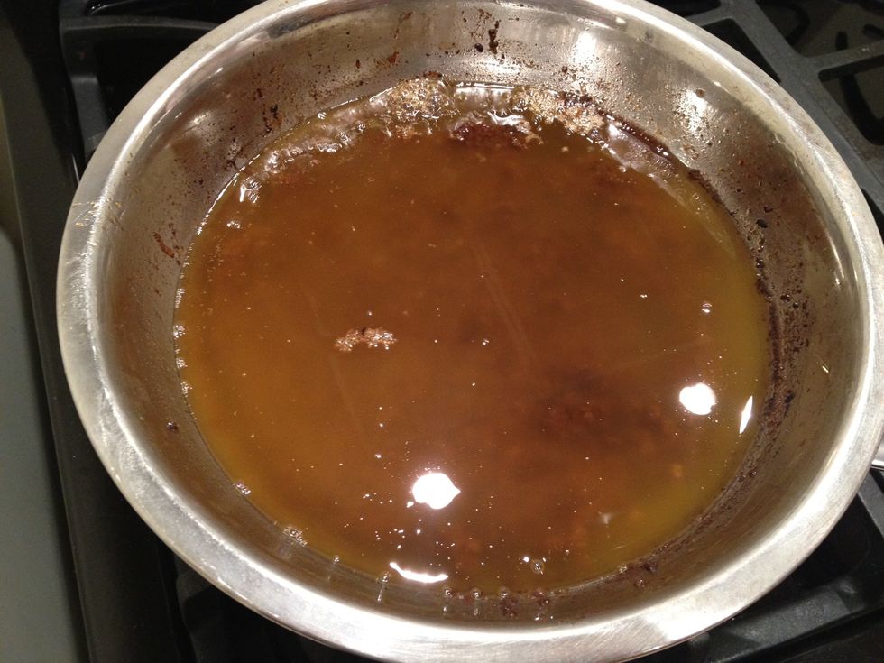 When the wax has completely melted, you will notice that the debris will be on the bottom, and the clear wax will have floated to the top.