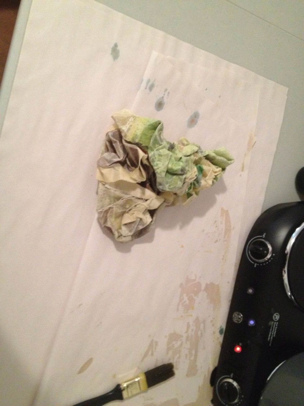 When the wax is cooled crumble it up into a ball,and make sure to really crumble it so the fabric is exposed from the wax this will allow the dye to soak in.